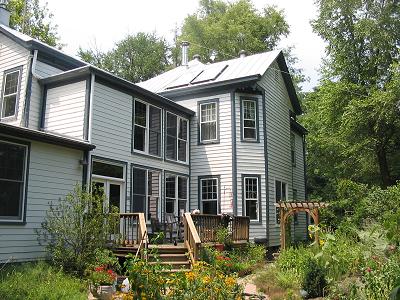 Solar Thermal panels on south face of main house over enclosed sun porch